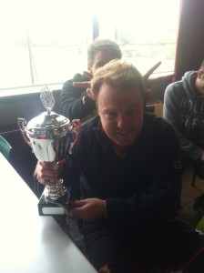 Top scorer Rob Sterry shows off the latest addition to the WIFC trophy cabinet